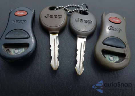 2001 Jeep Grand Cherokee Laredo из США, поврежденный, VIN 1J4GX48S51C653618